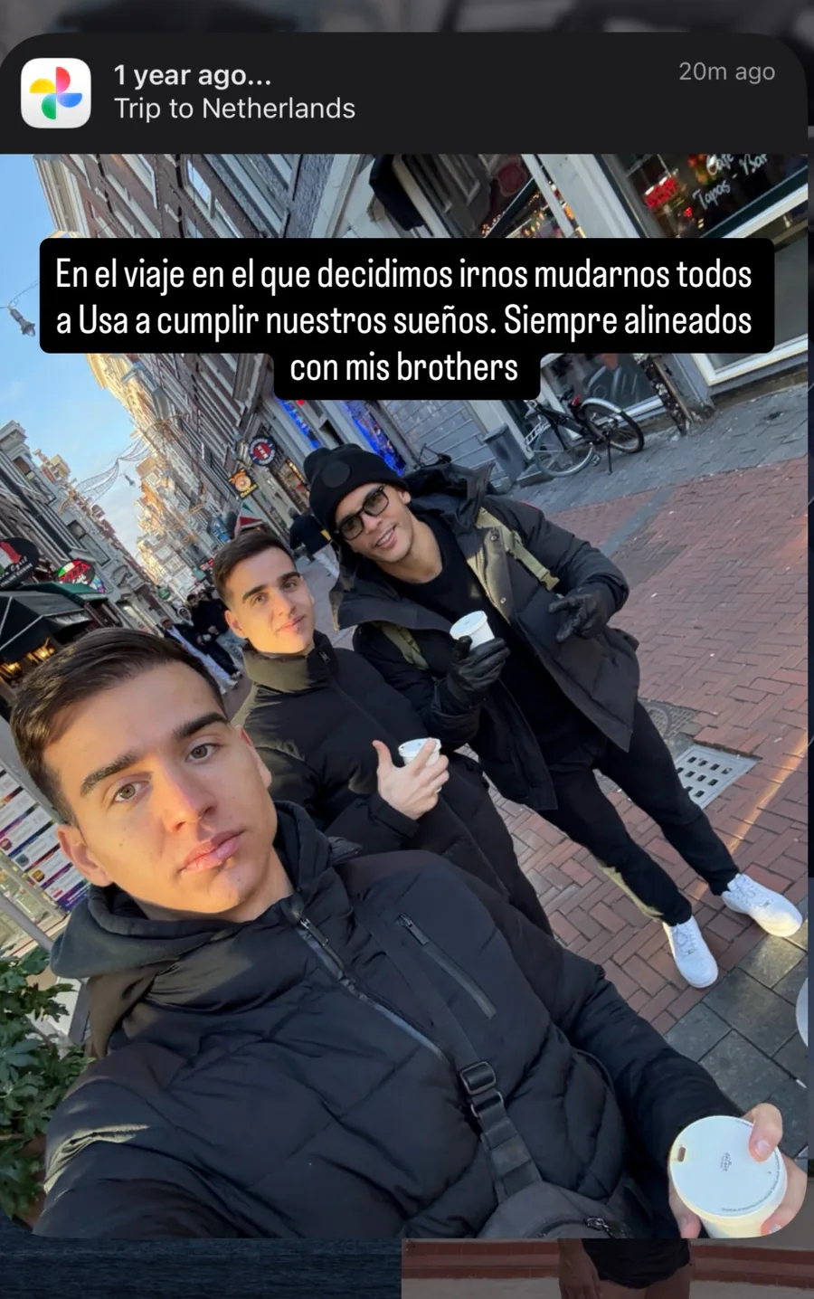 Alejandro's story: a selfie with his brothers on an Amsterdam street, with the words: on the trip where we decided to move to the USA to fulfil our dreams, always aligned with my brothers